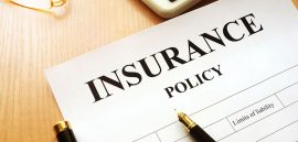 Insurance policy on a desk.